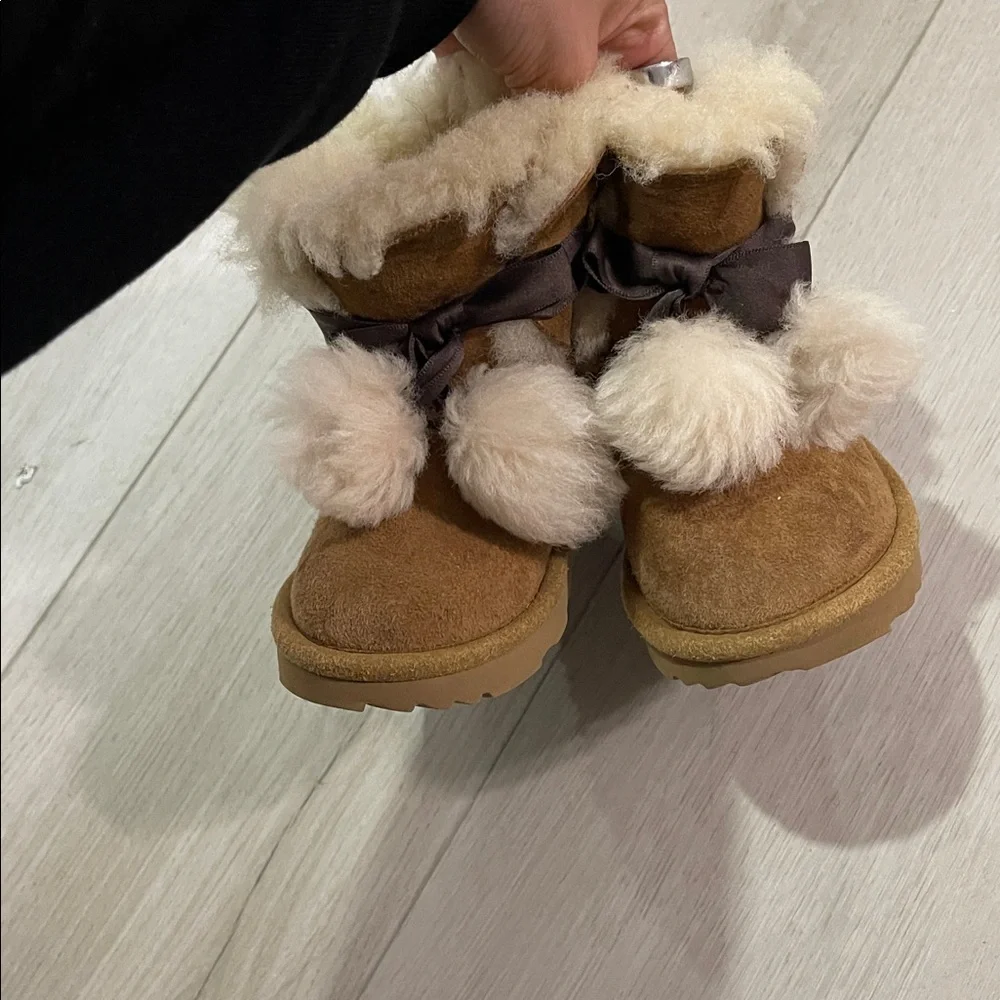 UGG Tan Shearling Boots with Pom Poms
